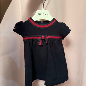 Original Gucci dark blue dress for baby girl. Needs to be taken to cleaners